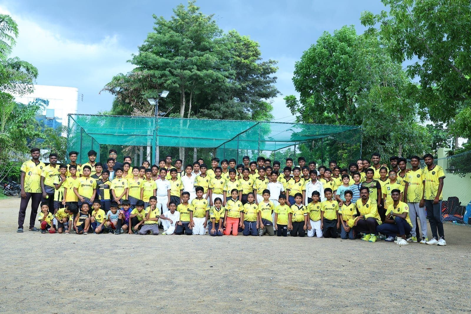 DJ Bravo 47 Academy of Champions junior squad posing together outdoors
