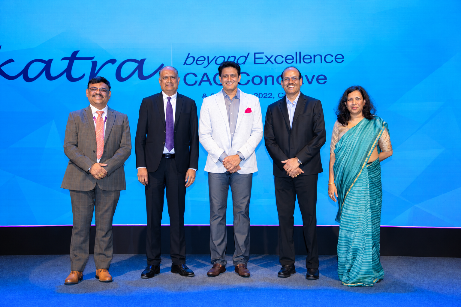 Delegates posing on stage at the Beyond Excellence CAG Conclave